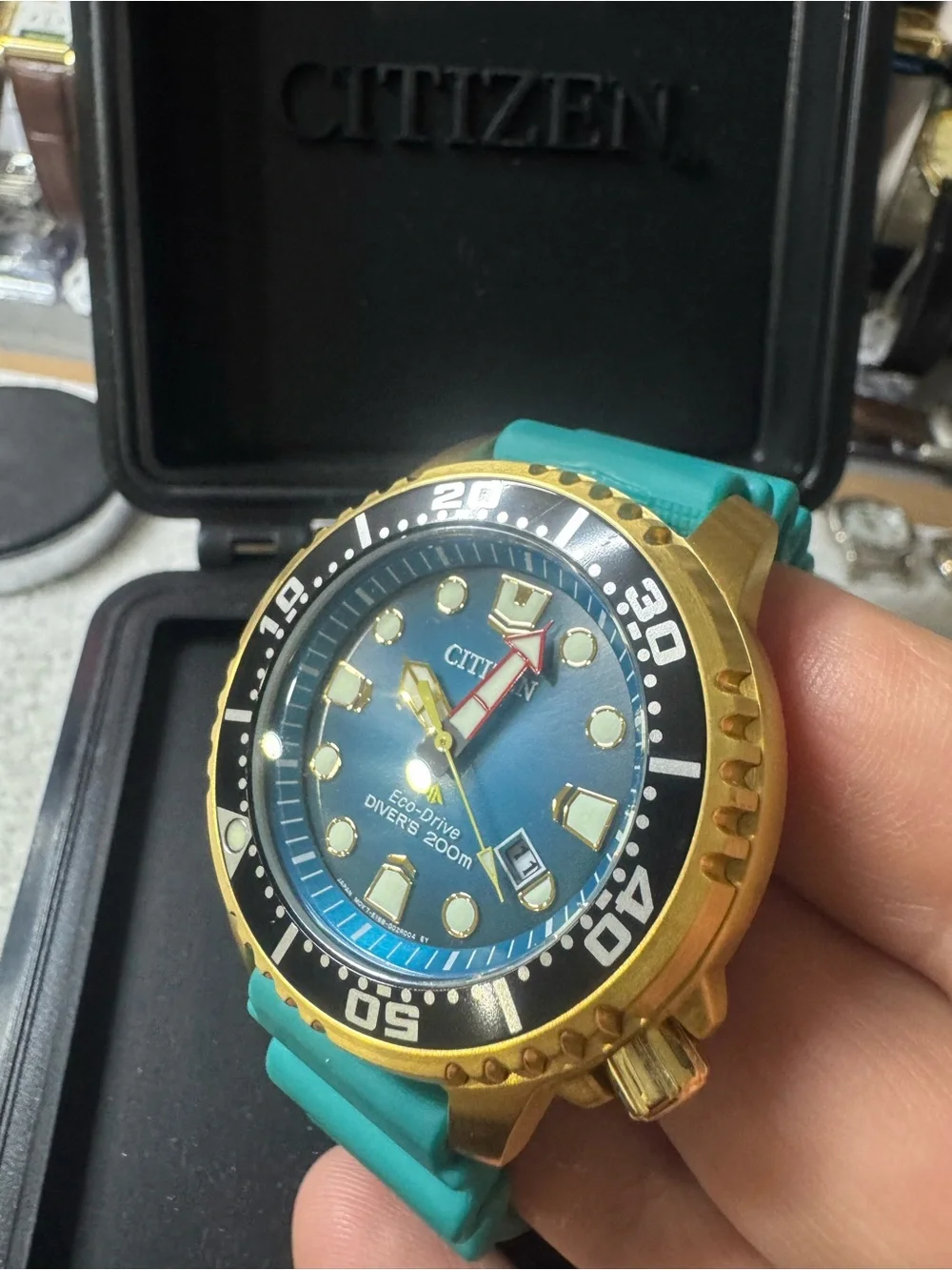 #190 Citizen Blue Dial Diver Watch with Gold-Tone Case and Teal Strap